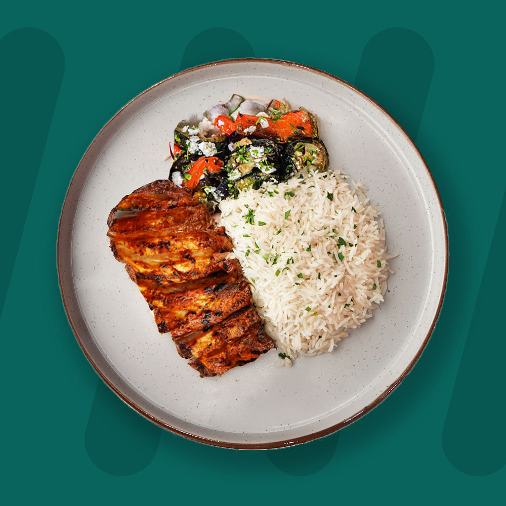 Harissa And Orange Chicken, Coconut Rice, Roasted Mix Veg With Feta & Garden Herbs