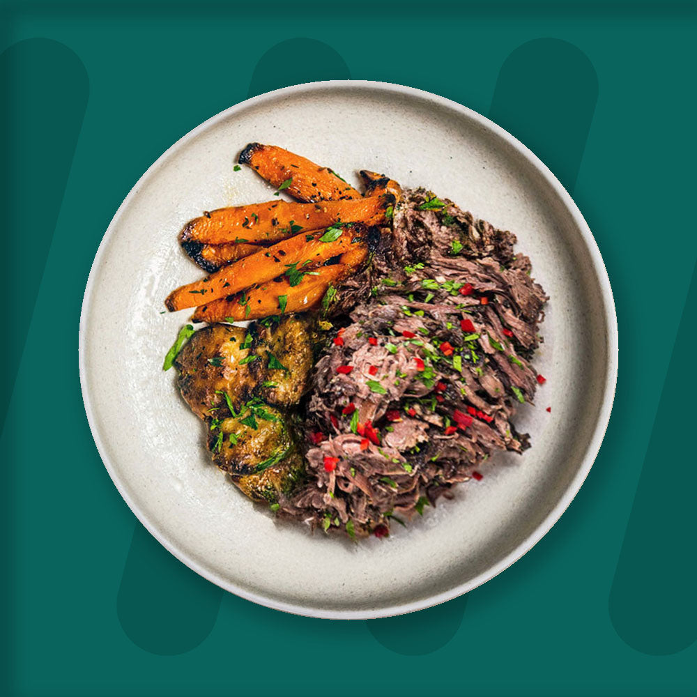 Smoked Pulled Beef, Garlic & Herb Crushed New Potato, Orange Cumin Glazed Carrots