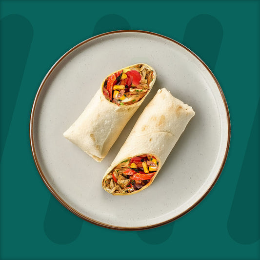 Harissa Chicken Wrap With Halloumi, Roasted Mix Veg & Garden Herbs